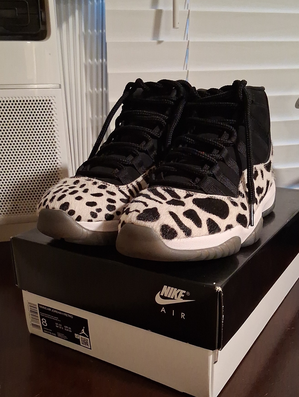 Nike Air JORDAN 11 RETRO Sneakers in Black and White Animal Print